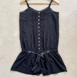Lace trimmed drop waist romper